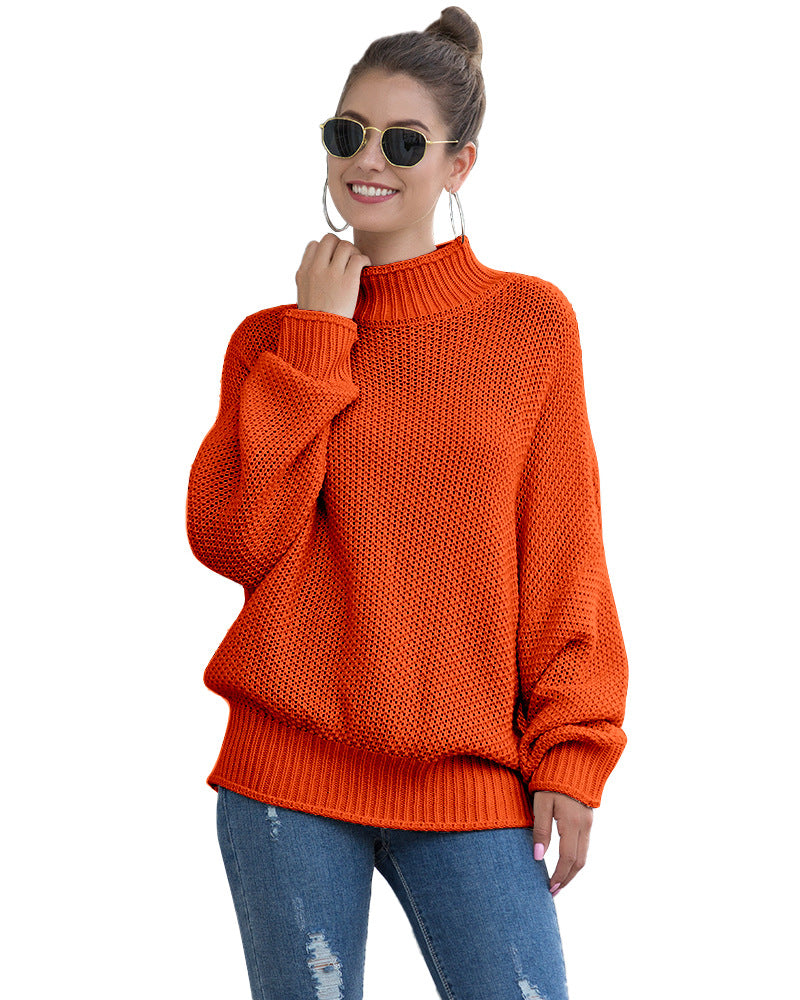 Women's loose turtleneck knit sweater front view