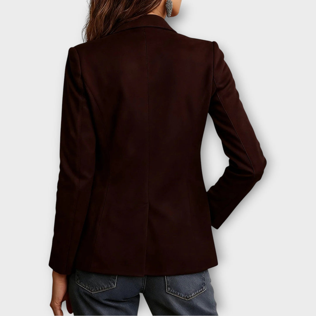 Women's brown vintage blazer with front button closure