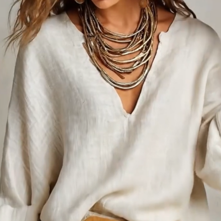 Woman wearing relaxed V-neck top and wide-leg pants set