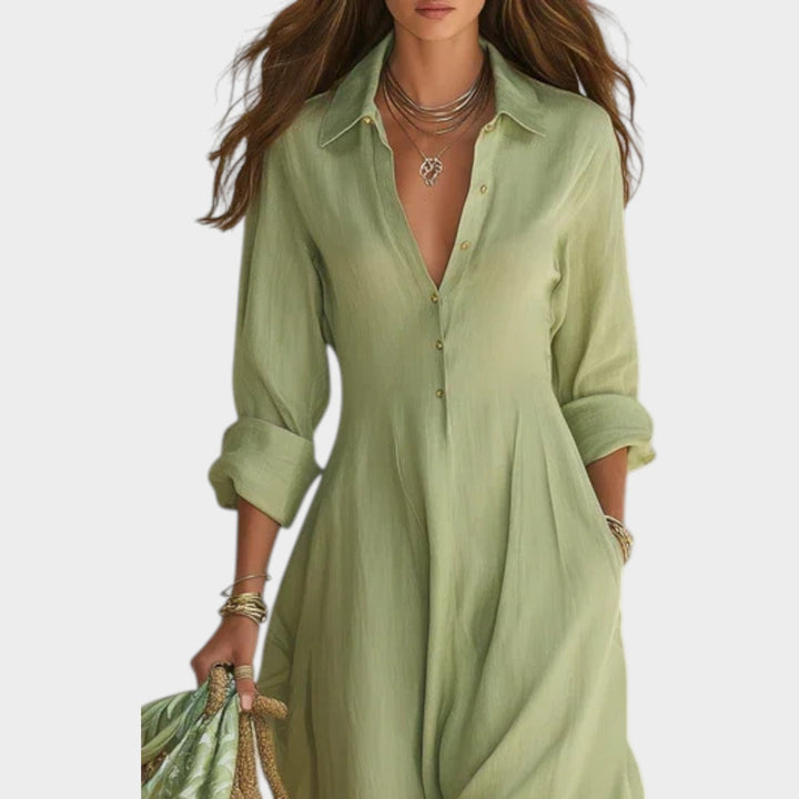 Woman in button front maxi dress with long sleeves
