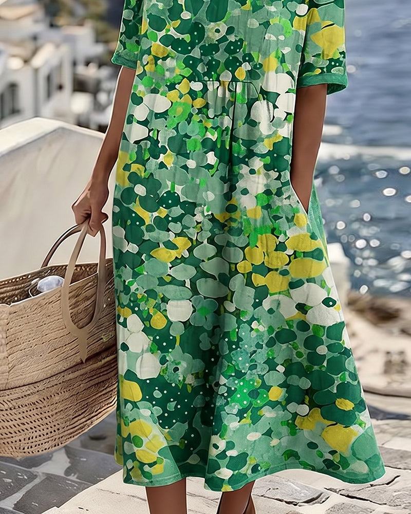Woman wearing abstract floral print midi dress with short sleeves