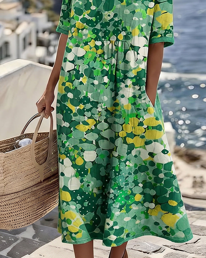 Woman wearing abstract floral print midi dress with short sleeves