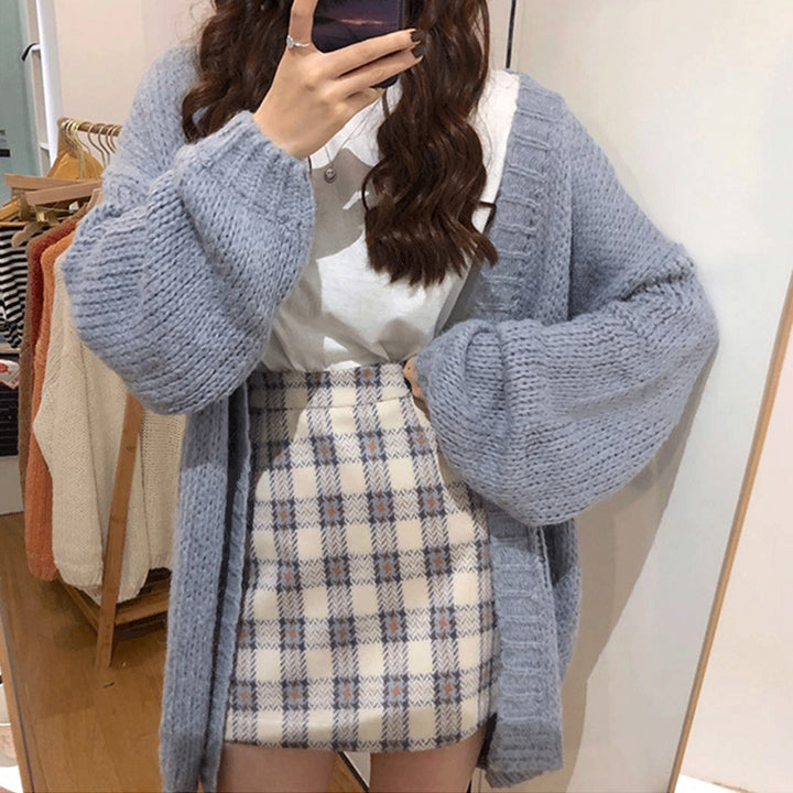 Woman wearing thick knit relaxed fit sweater