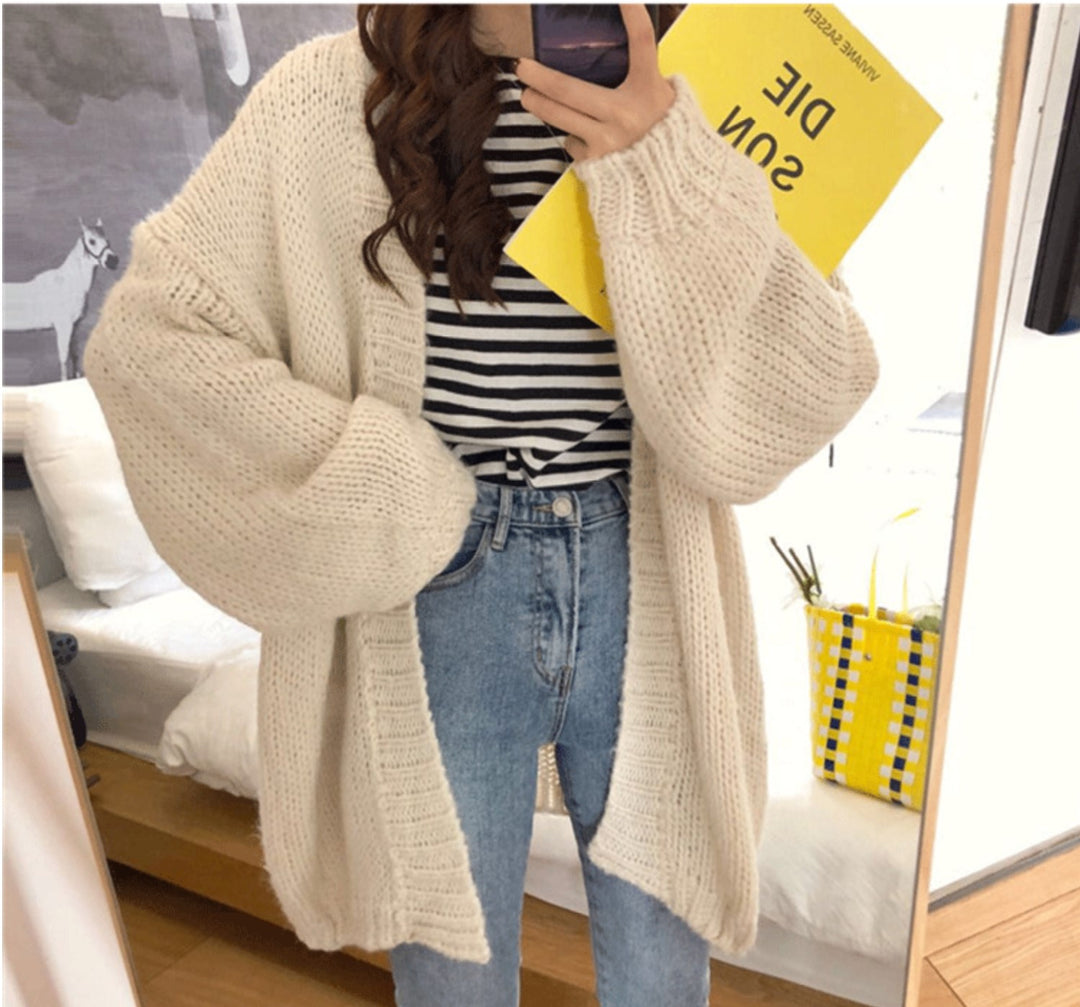 Woman wearing thick knit relaxed fit sweater
