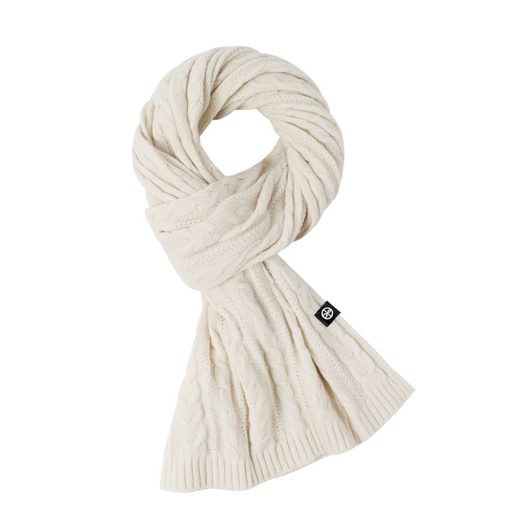 Woman wearing solid color long winter scarf outdoors
