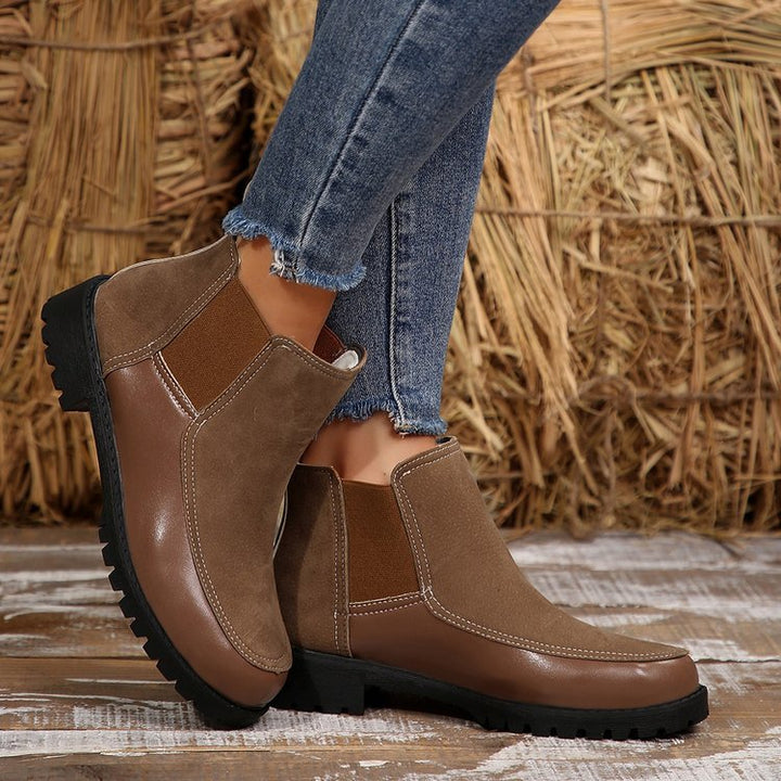 Women's black platform ankle boots with short Martin-style shaft