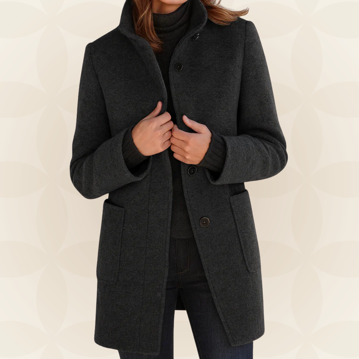 Woman wearing straight-cut winter coat with high collar