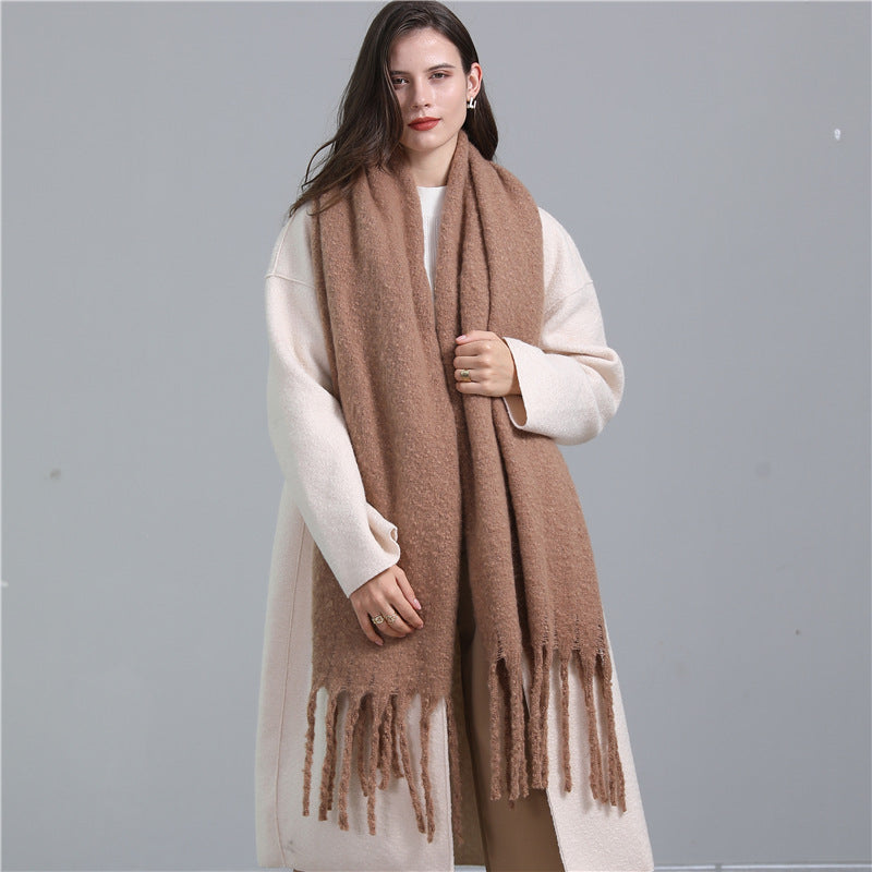 Women's long solid color winter scarf with tassel ends