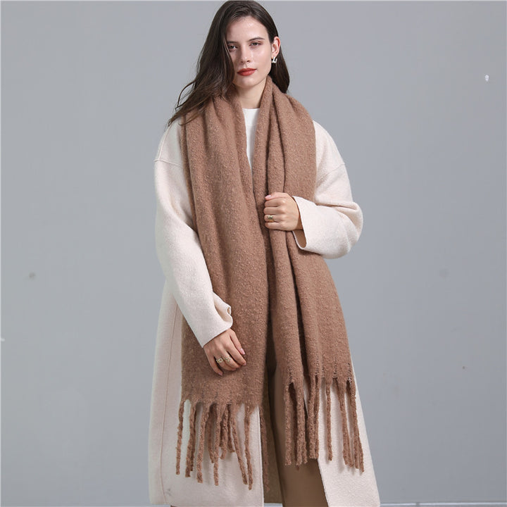 Women's long solid color winter scarf with tassel ends
