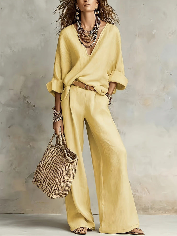 Woman wearing relaxed V-neck top and wide-leg pants set