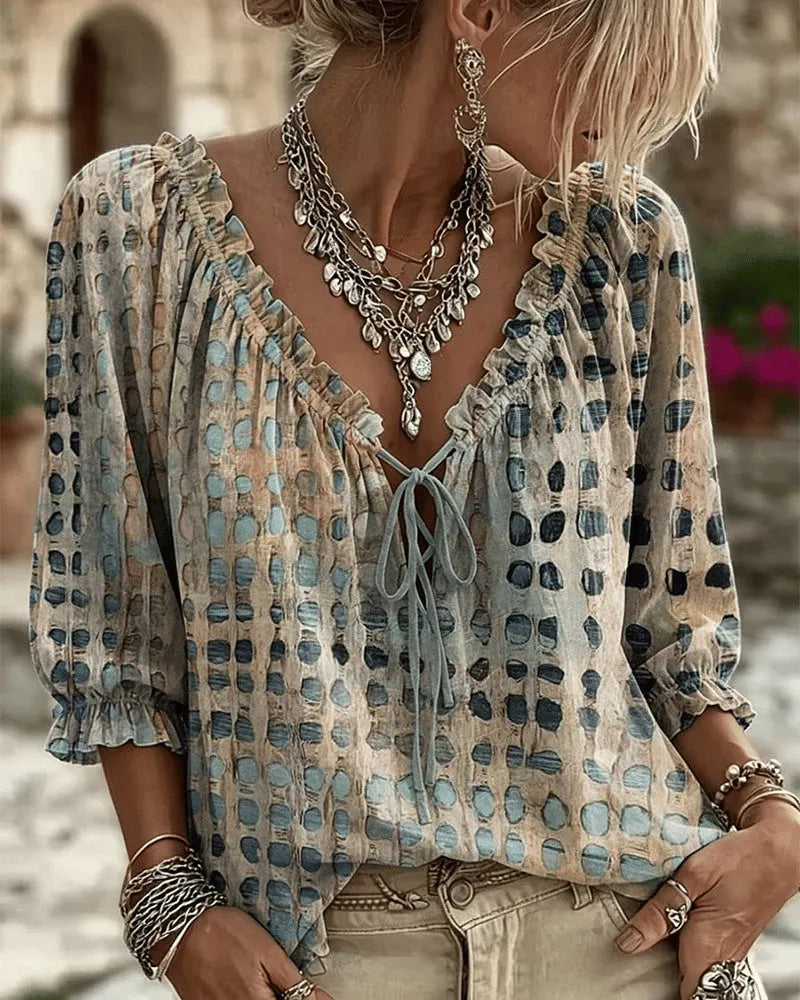 Women's polka dot blouse with lace-up V-neck