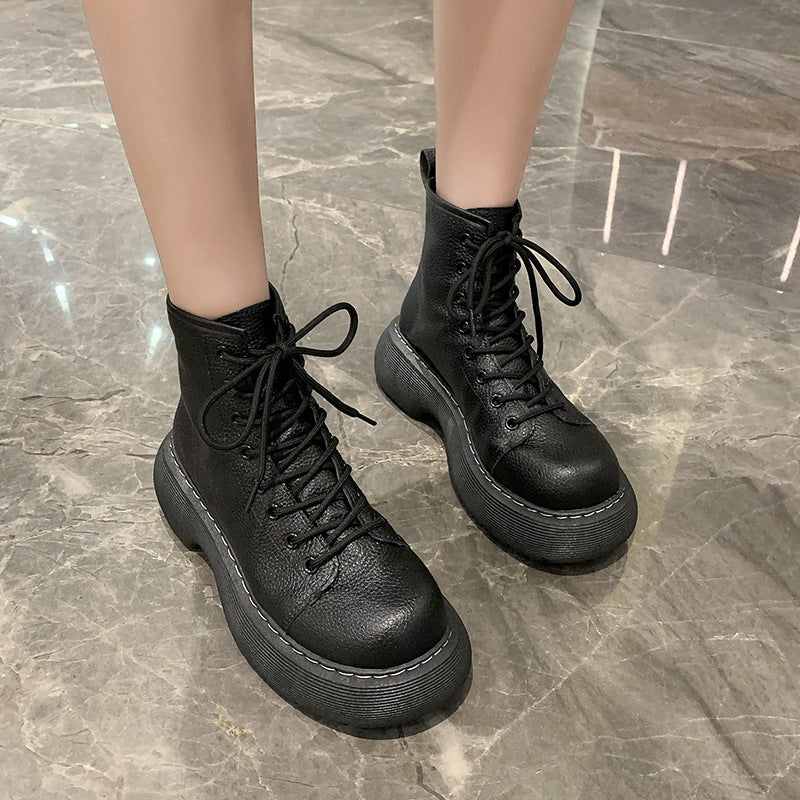 Women's black lace-up ankle boots with flat heel and round toe