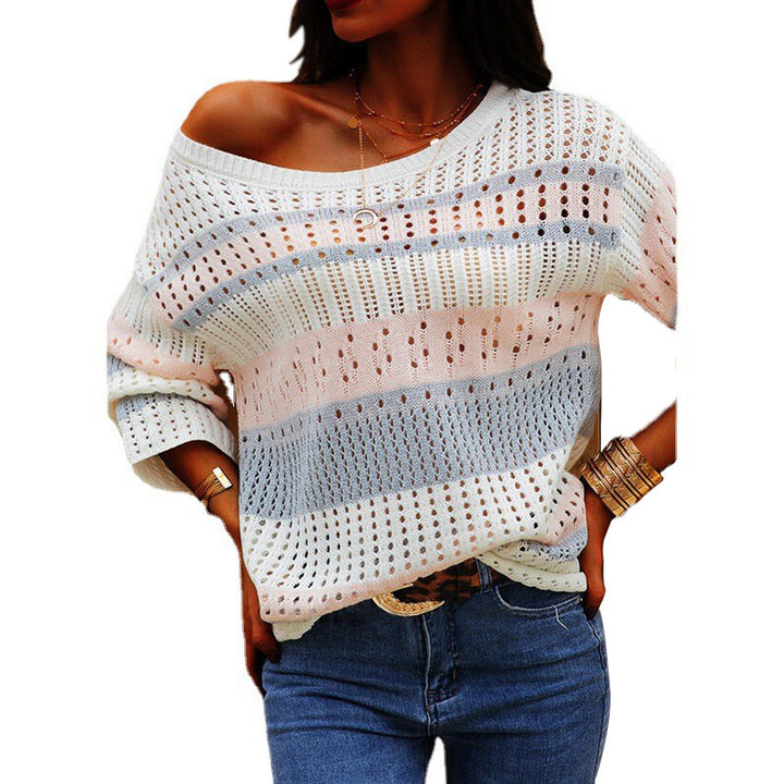 Pink loose striped knit sweater on model
