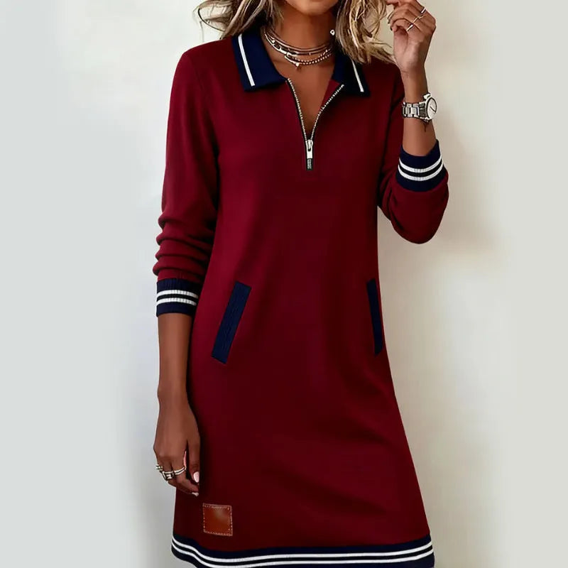 Women's polo dress with quarter-zip collar and front pockets