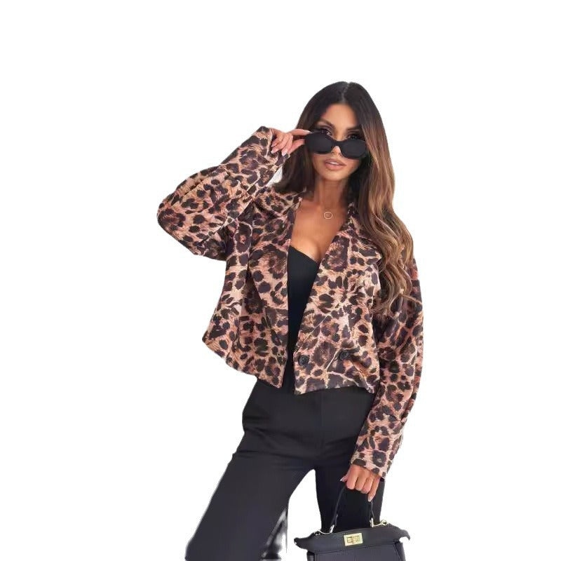 Woman wearing short leopard print blazer with long sleeves