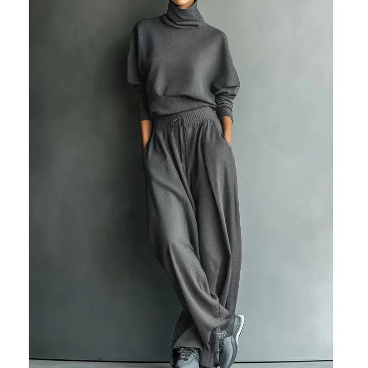 Woman wearing turtleneck two piece set with wide-leg pants