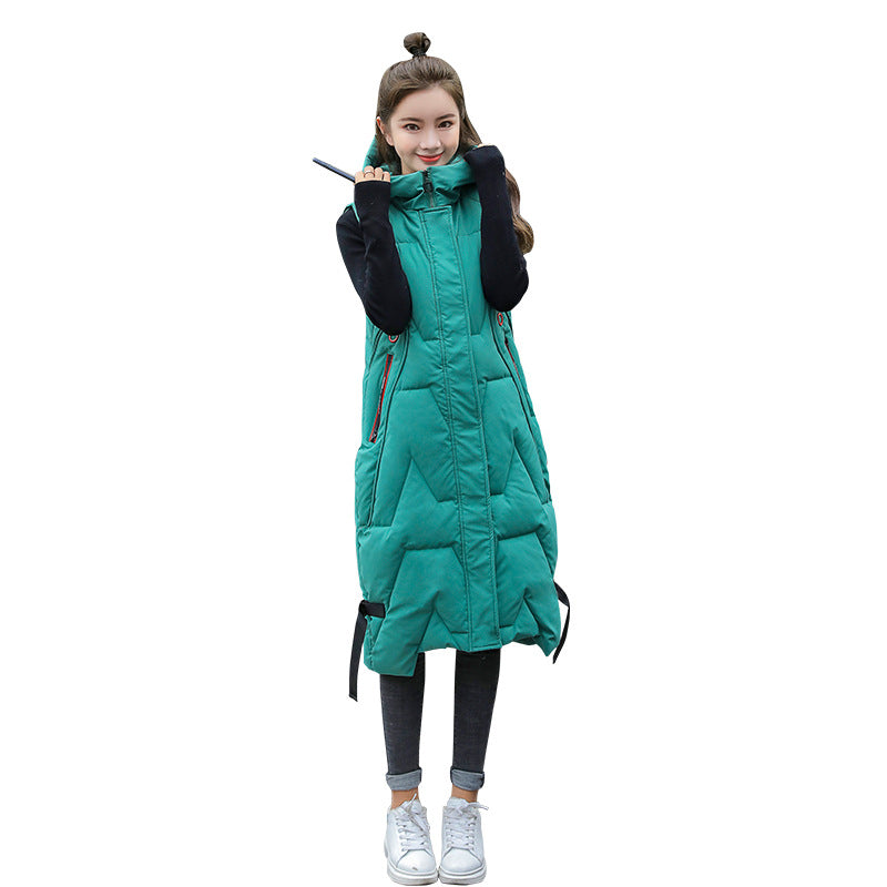 Women's long hooded puffer vest with zip closure