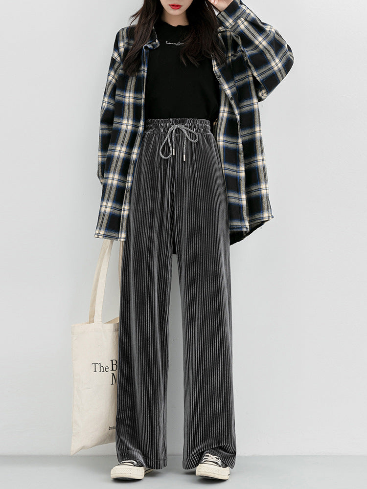 Woman wearing high waist corduroy wide leg pants
