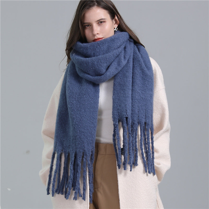 Women's long solid color winter scarf with tassel ends