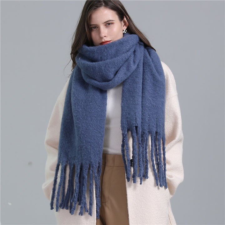 Women's long solid color winter scarf with tassel ends
