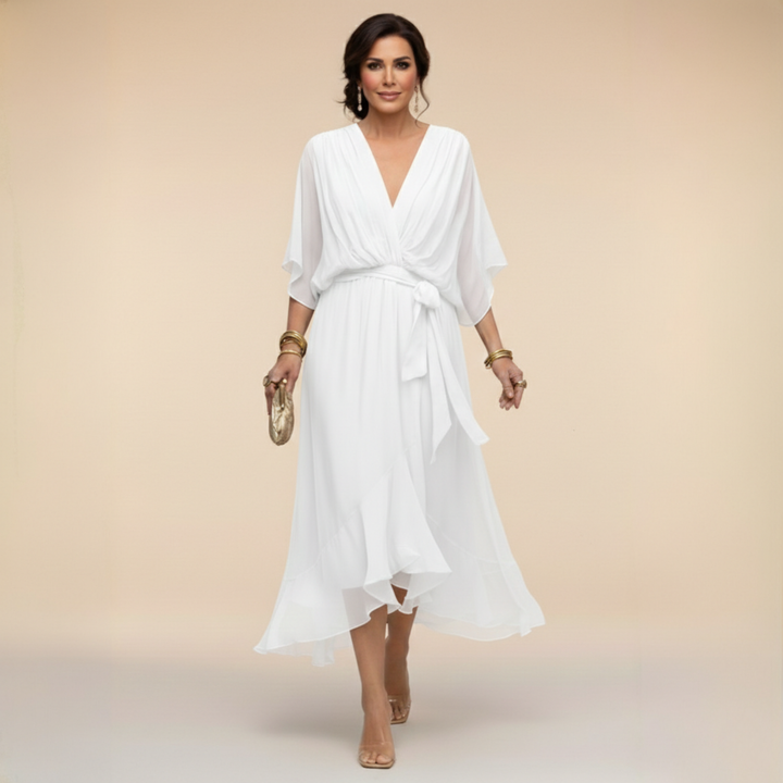 Woman wearing flowy V-neck dress outdoors