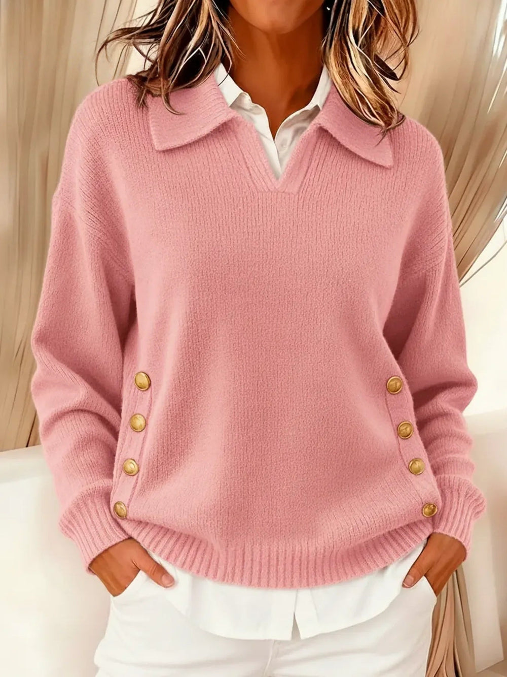 Woman wearing V-neck sweater with fold-over polo collar