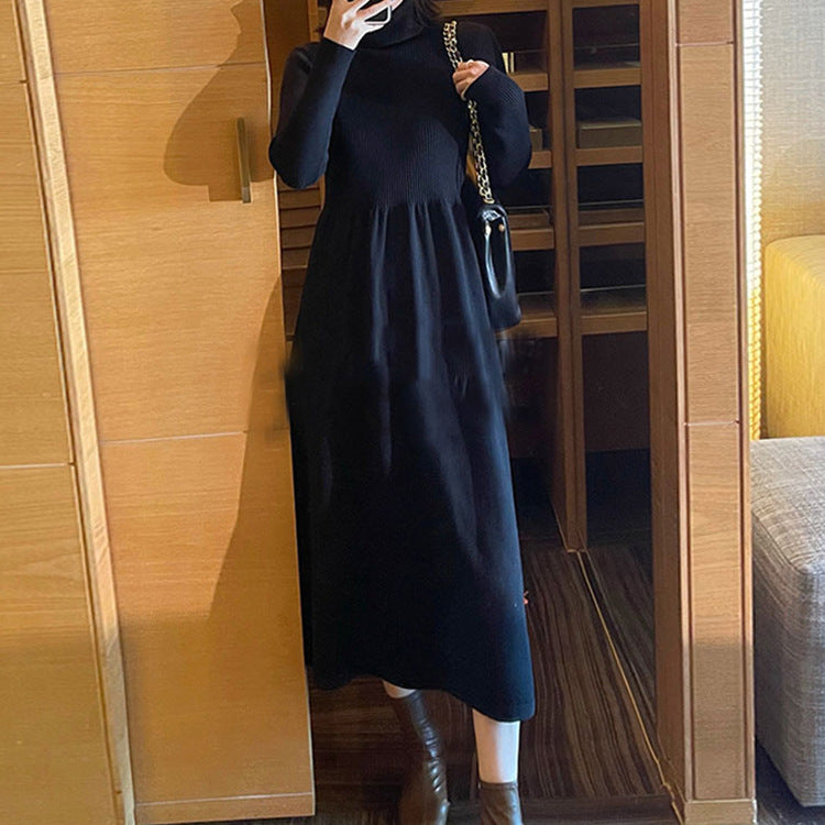 Women's mid-length knit sweater dress with elastic waist