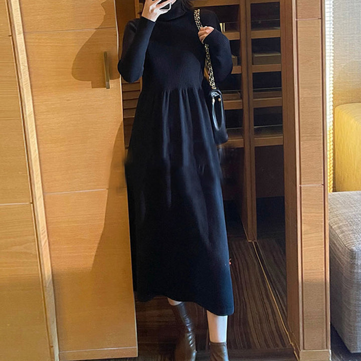 Women's mid-length knit sweater dress with elastic waist