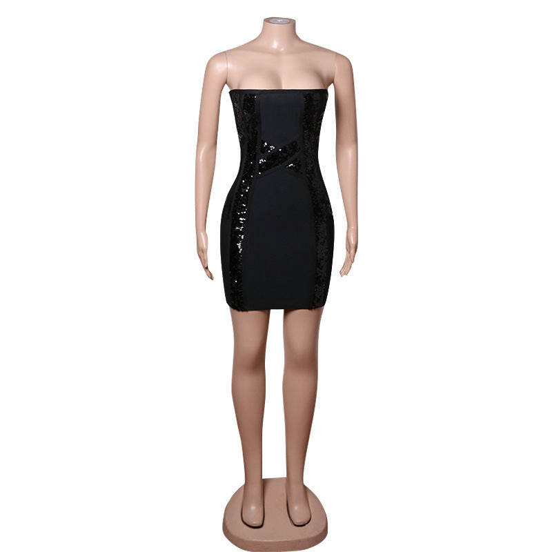Woman wearing black sequin high waist mini skirt