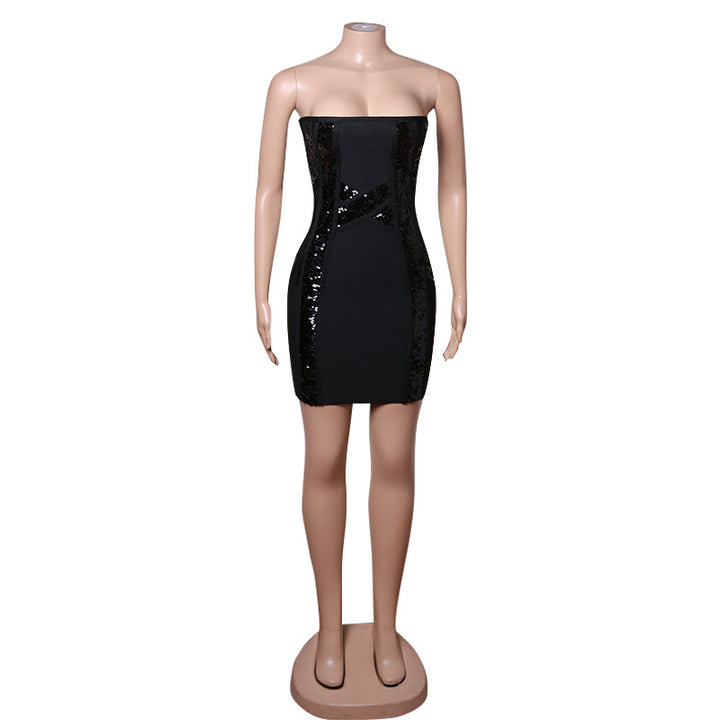 Woman wearing black sequin high waist mini skirt