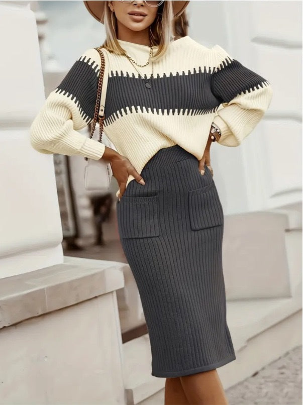 Woman wearing black knit sweater and skirt set