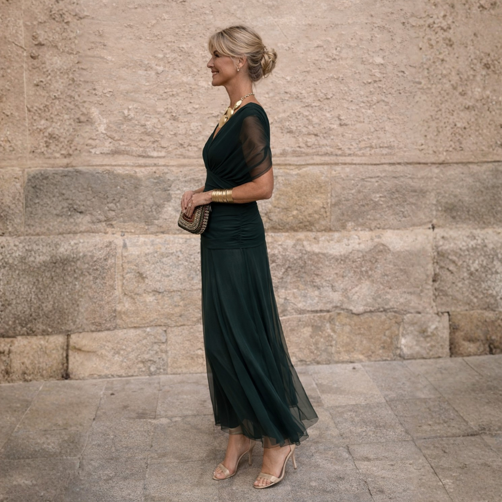 Woman wearing draped maxi dress with V-neck
