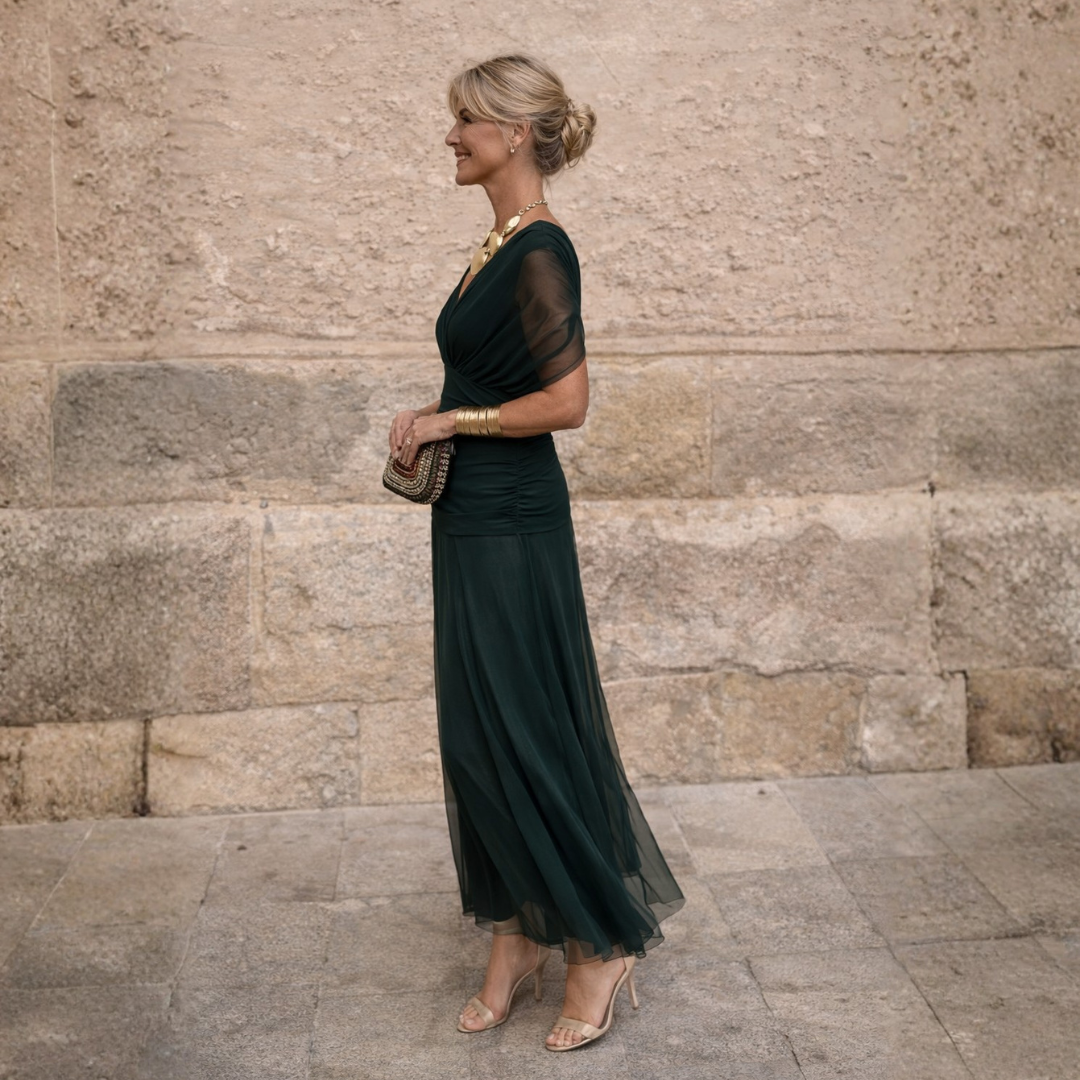 Woman wearing long maxi dress with crossover V-neck