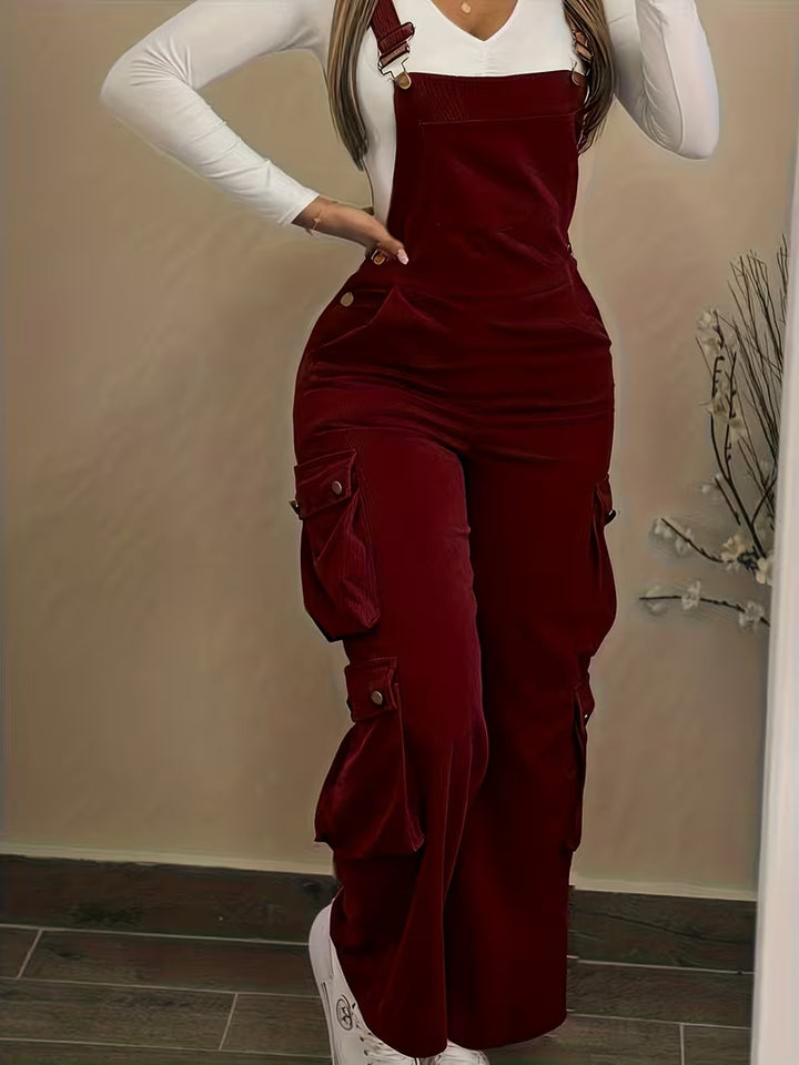 Woman wearing corduroy overalls with pockets