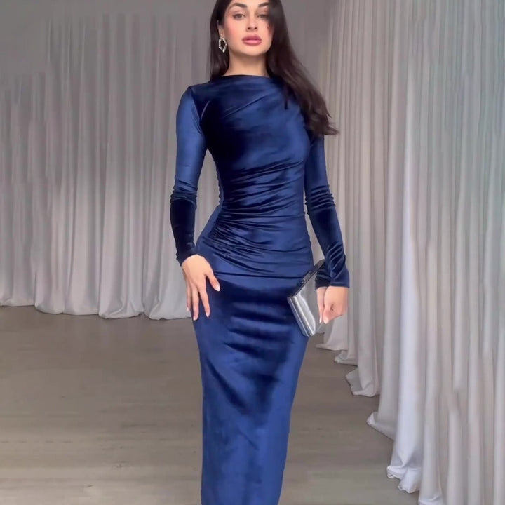 Woman wearing velvet long sleeve slim fit dress
