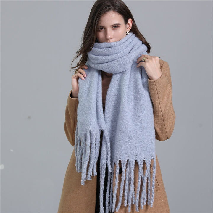 Women's long solid color winter scarf with tassel ends