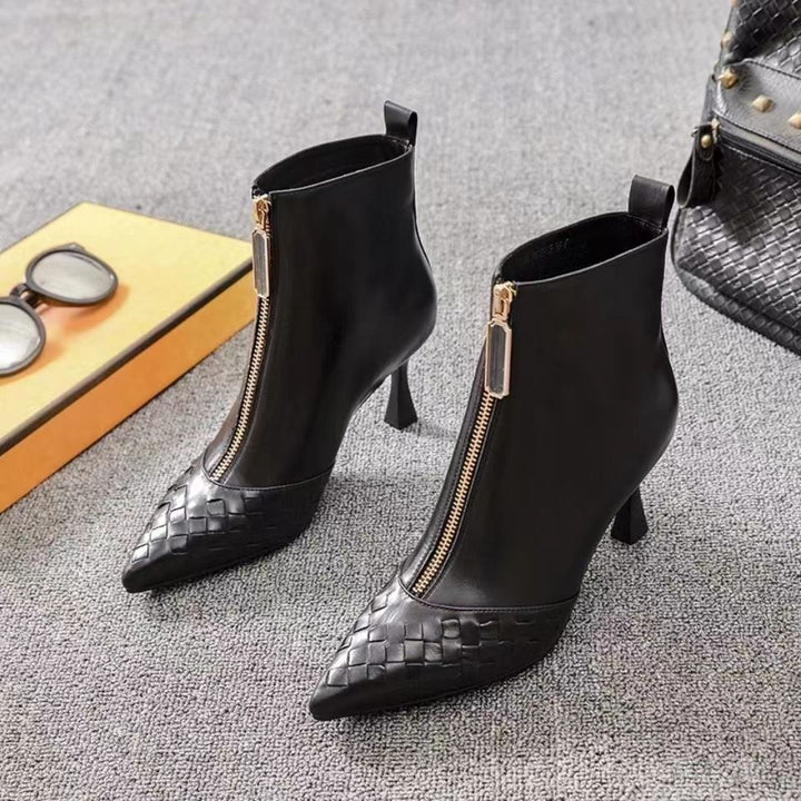 Black pointed toe stiletto ankle boots for women with mid heel