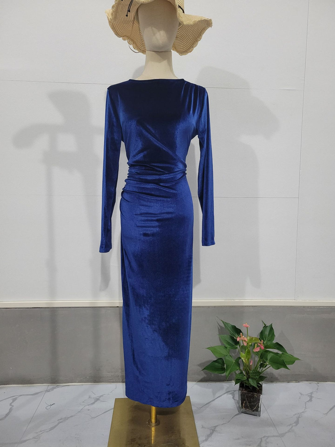 Woman wearing velvet long sleeve slim fit dress