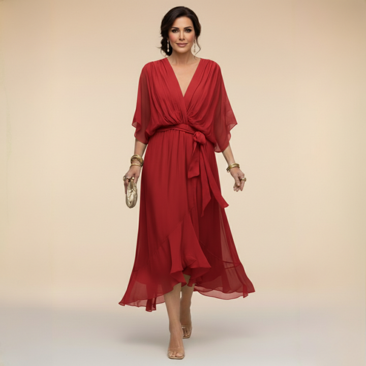 Woman wearing flowy V-neck dress outdoors