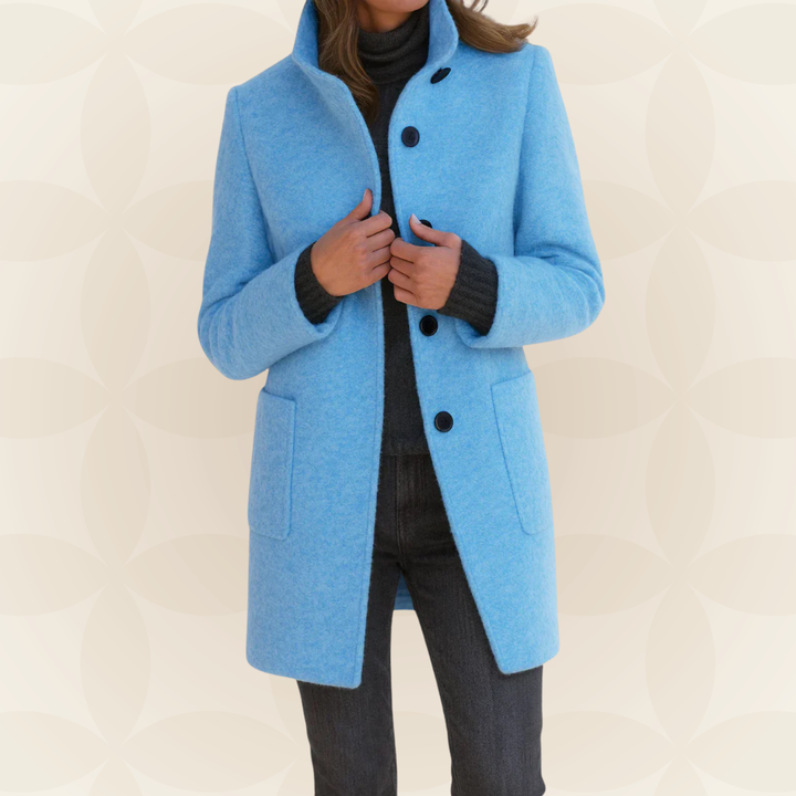 Woman wearing straight-cut winter coat with high collar