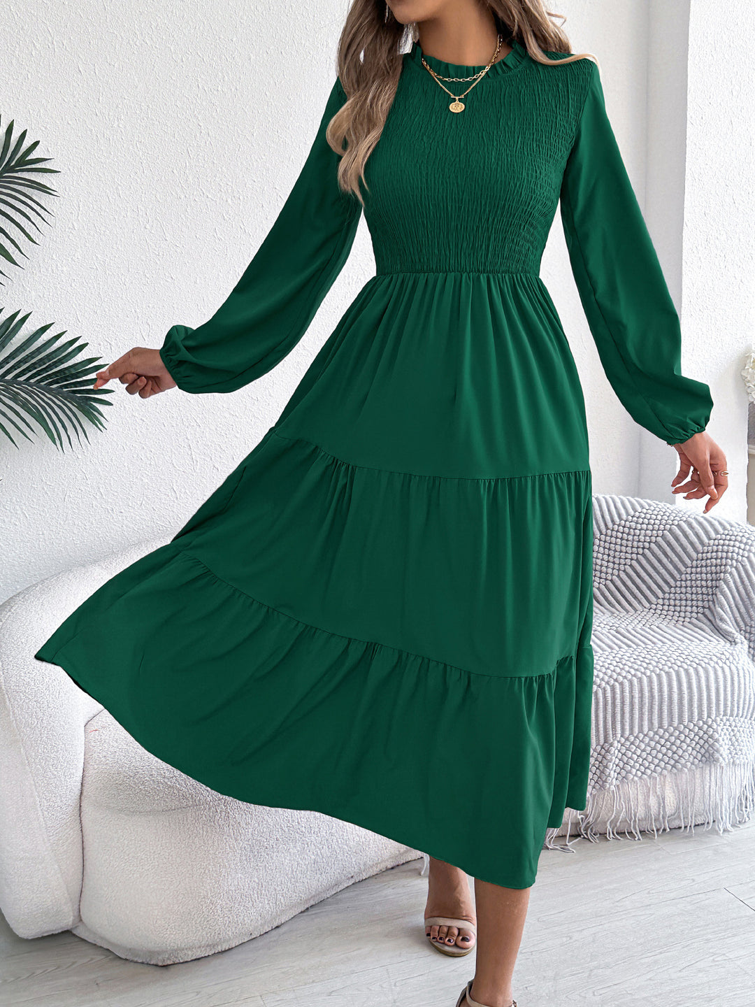 Long sleeve slim fit maxi dress with ruched detail