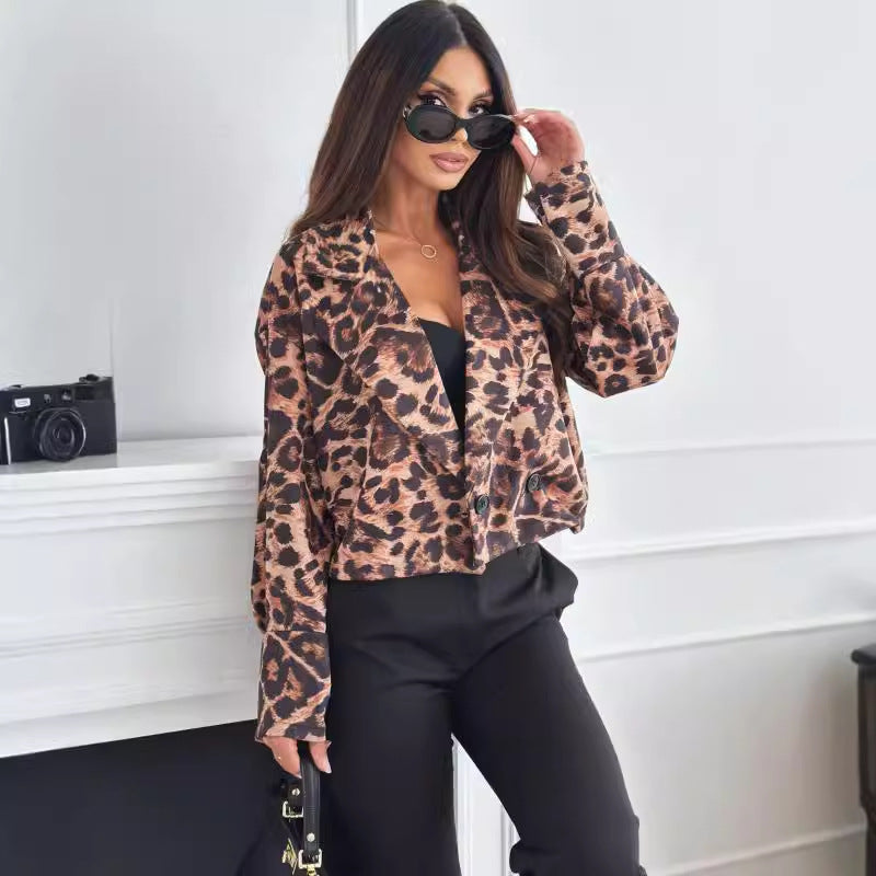 Woman wearing short leopard print blazer with long sleeves