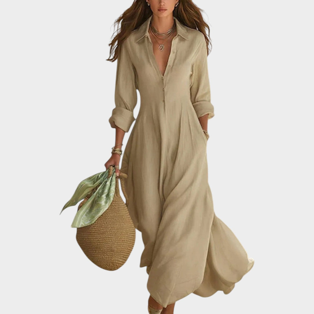 Woman in button front maxi dress with long sleeves