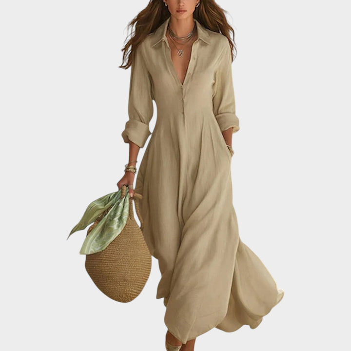 Woman in button front maxi dress with long sleeves