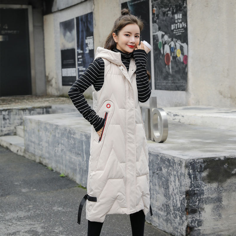Women's long hooded puffer vest with zip closure