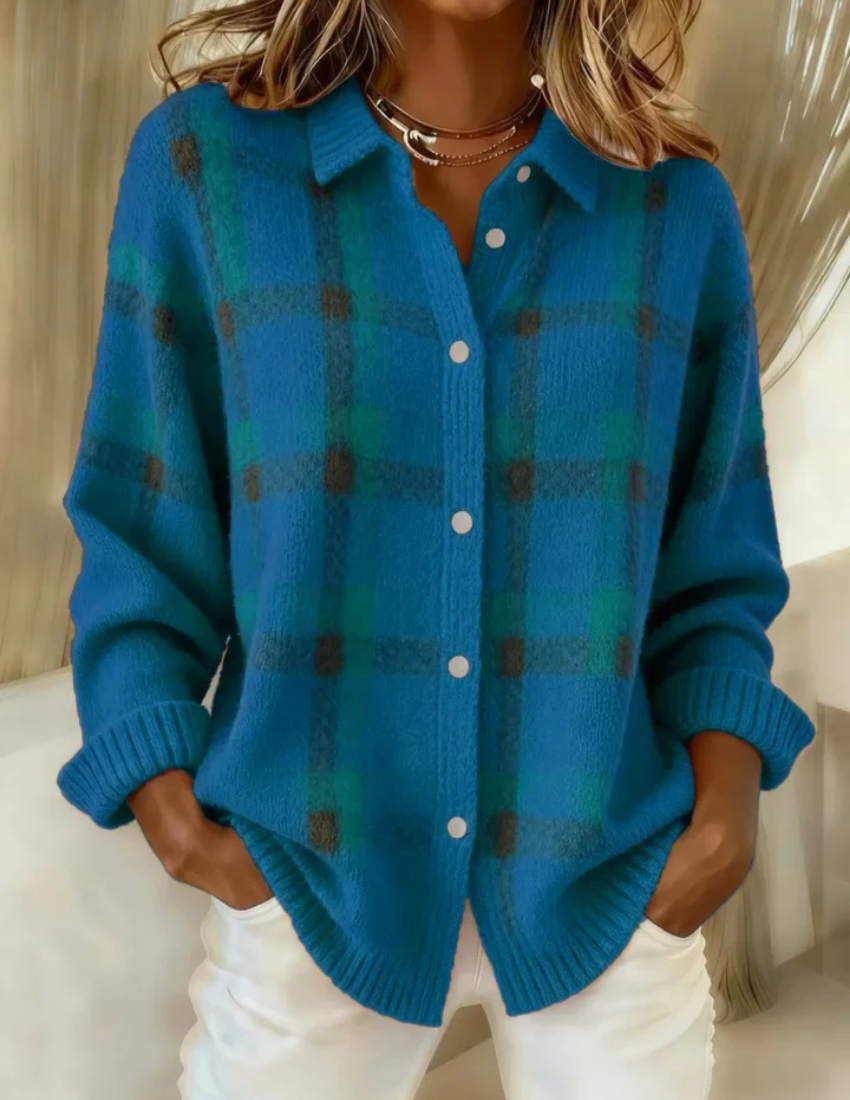 Woman wearing oversized plaid button-up knit cardigan