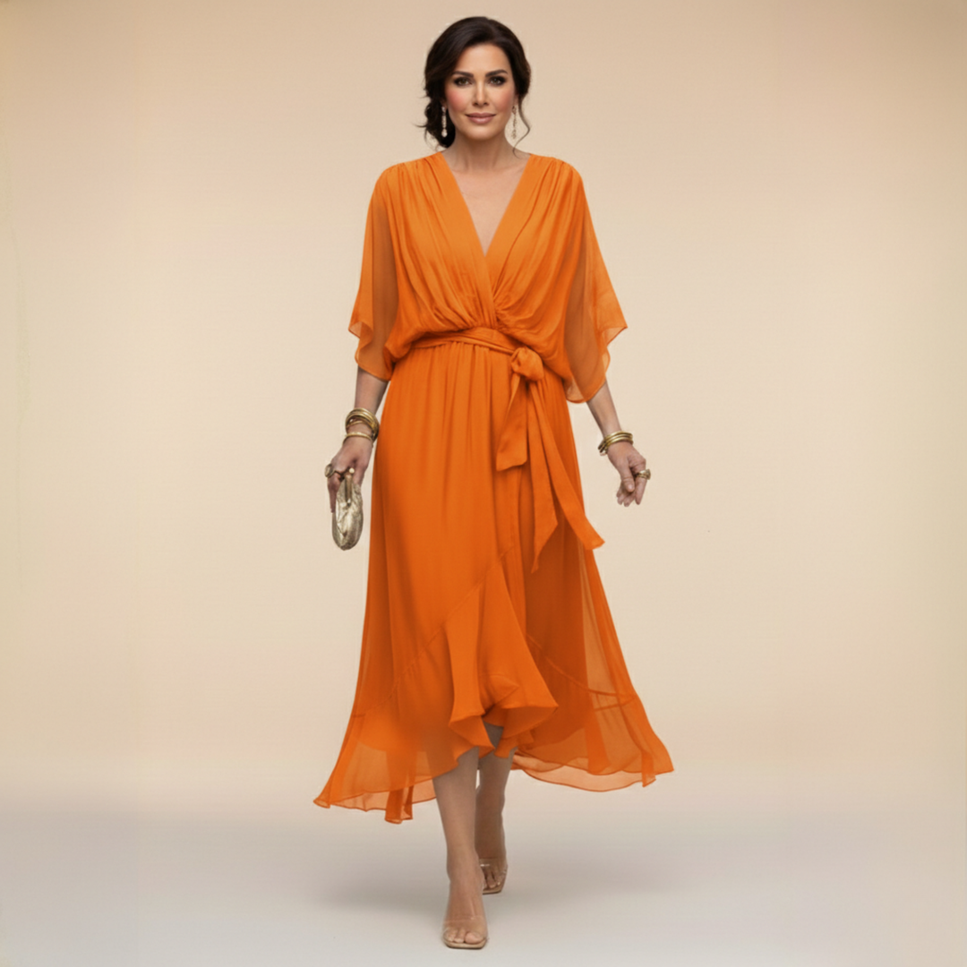 Woman wearing flowy V-neck dress outdoors