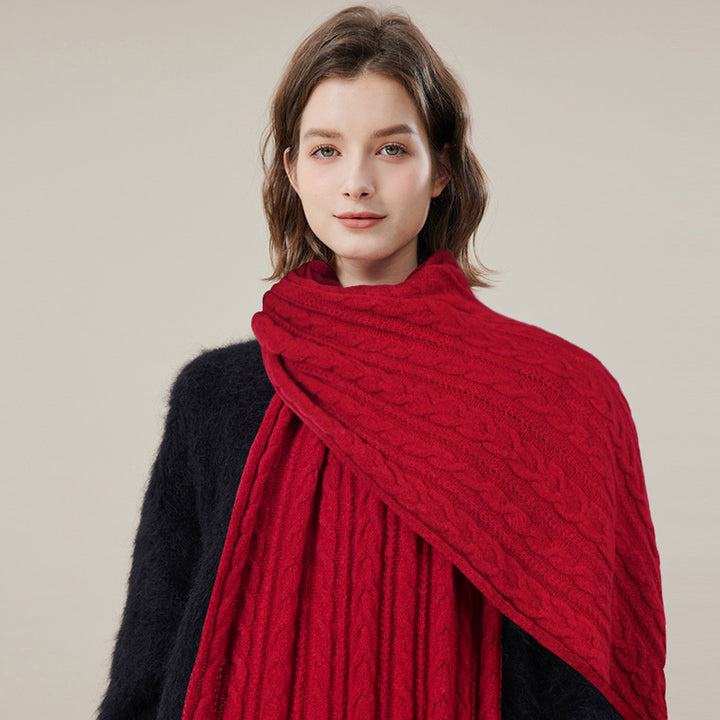 Woman wearing solid color long winter scarf outdoors