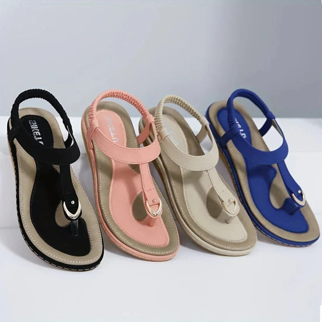 Brea | Women's Suede T-Strap Metal Detail Elastic Slingback Flat Sandals Carol & Margaret Wilmington