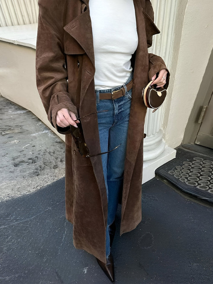 Woman wearing a women's raincoat for rainy days